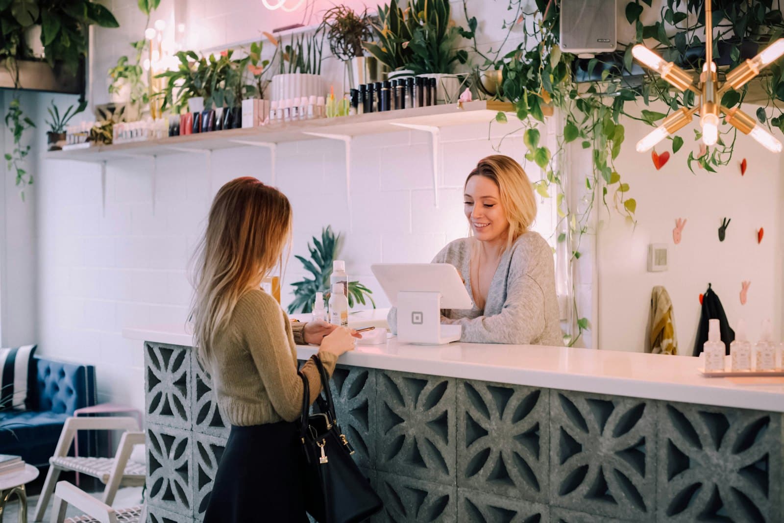 Merchant preparing ecommerce orders in a studio workspace